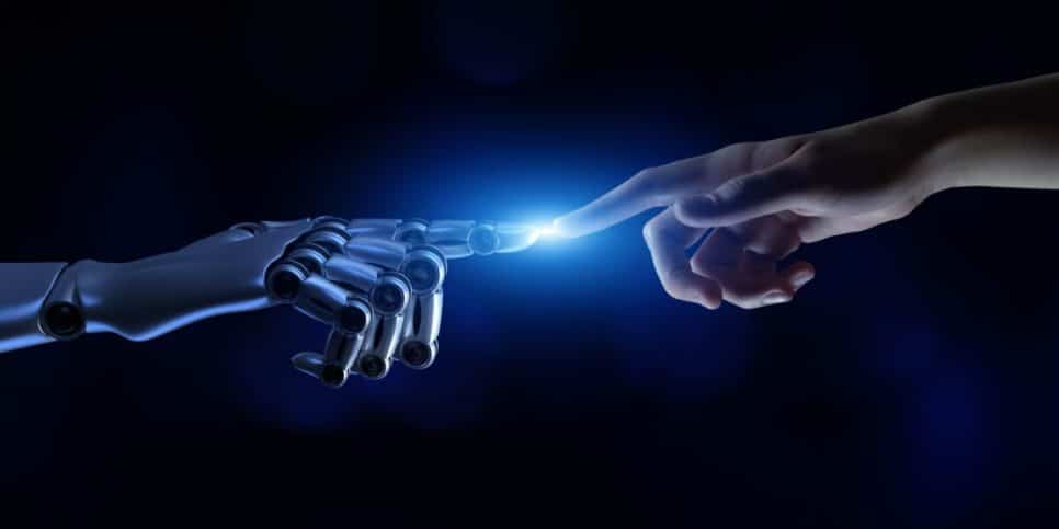Inteligência artificial e tecnologia futurista representada por uma mão robótica tocando o dedo de uma mão humana, simbolizando a conexão entre humanos e máquinas, filosofia, empresas